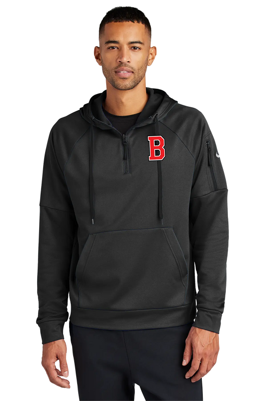 A man wearing a black pullover hoodie with a red Boston 'B' logo on the chest, photographed against a plain white background. Belvidere Lady Seaters Basketball, Paper Street Print Co, Blairstown, NJ.
