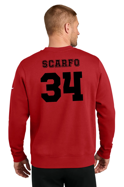 A man viewed from the back wearing a red crewneck sweatshirt with 'SCARFO' and the number '34' printed in black on the back. Belvidere Lady Seaters Basketball, Paper Street Print Co, Blairstown, NJ.
