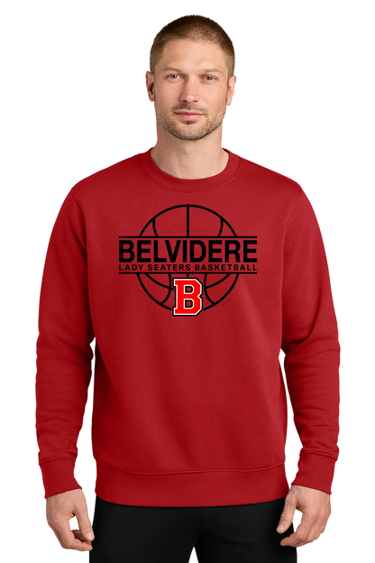 A man wearing a red crewneck sweatshirt with a black and red 'Belvidere Lady Seaters Basketball' graphic on the chest, set against a plain white background. Paper Street Print Co, Blairstown, NJ