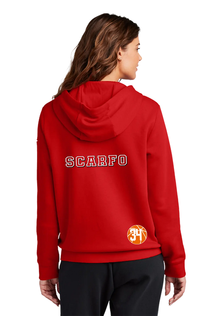 A woman shown from the back wearing a bright red hoodie with 'SCARFO' printed in white varsity-style letters across the upper back and a circular orange and yellow logo near the lower back. She is also wearing black pants against a plain white studio background. Blairstown Lady Seaters Basketball, Paper Street Print Co, Blairstown, NJ.