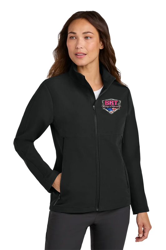 Woman wearing a black jacket with a logo on a white background. BRT Towing and Recovery, Paper Street Print Co, Blairstown, NJ.