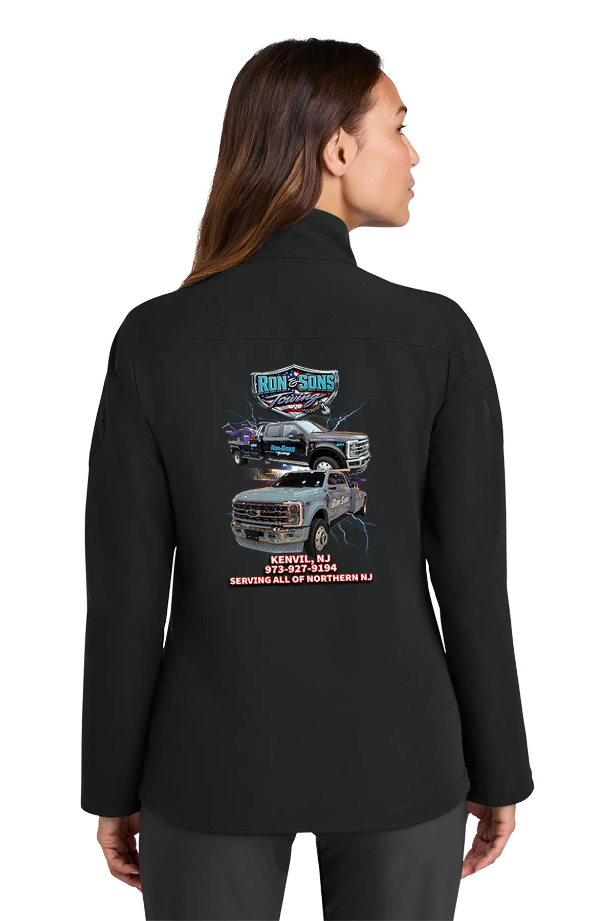 Person wearing a black jacket with a graphic design on the back, standing against a white background. Ron and Sons Towing, Paper Street Print Co, Blairstown, NJ.