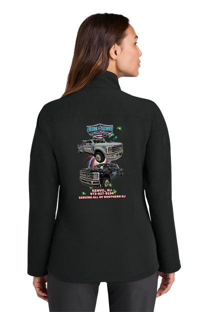 Person wearing a black jacket with a graphic design on the back, standing against a white background. Ron and Sons Towing, Paper Street Print Co, Blairstown, NJ.