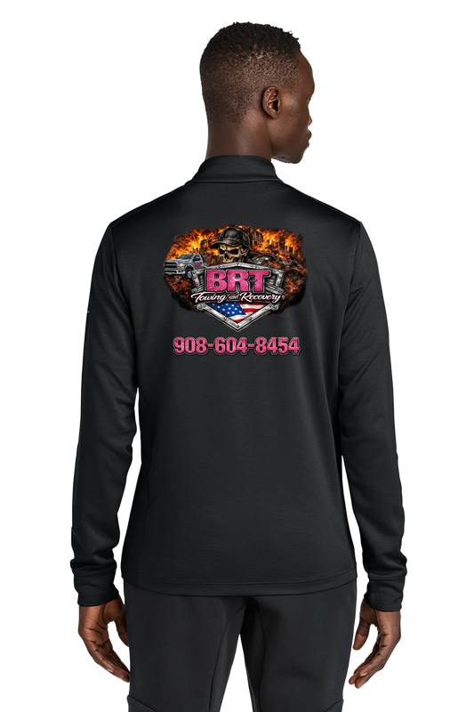 Person wearing a black long-sleeve shirt with a logo and text on the back, on a white background. BRT Towing and Recovery, Paper Street Print Co, Blairstown, NJ.