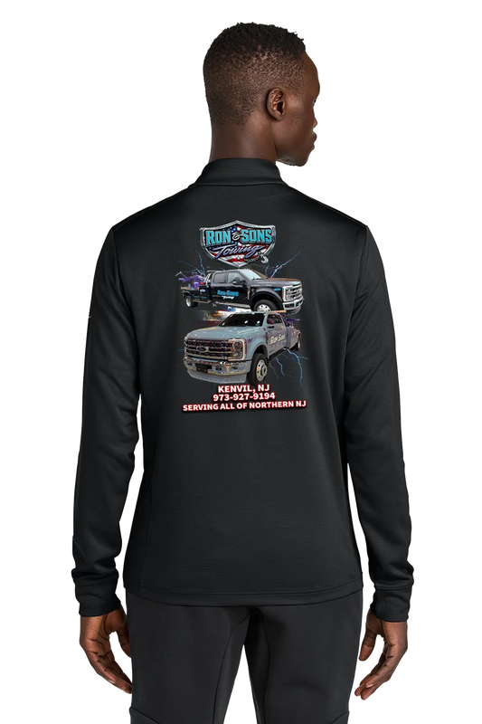 Black long-sleeve shirt with graphics and text on the back, worn by a person. Ron and Sons Towing, Paper Street Print Co, Blairstown, NJ.