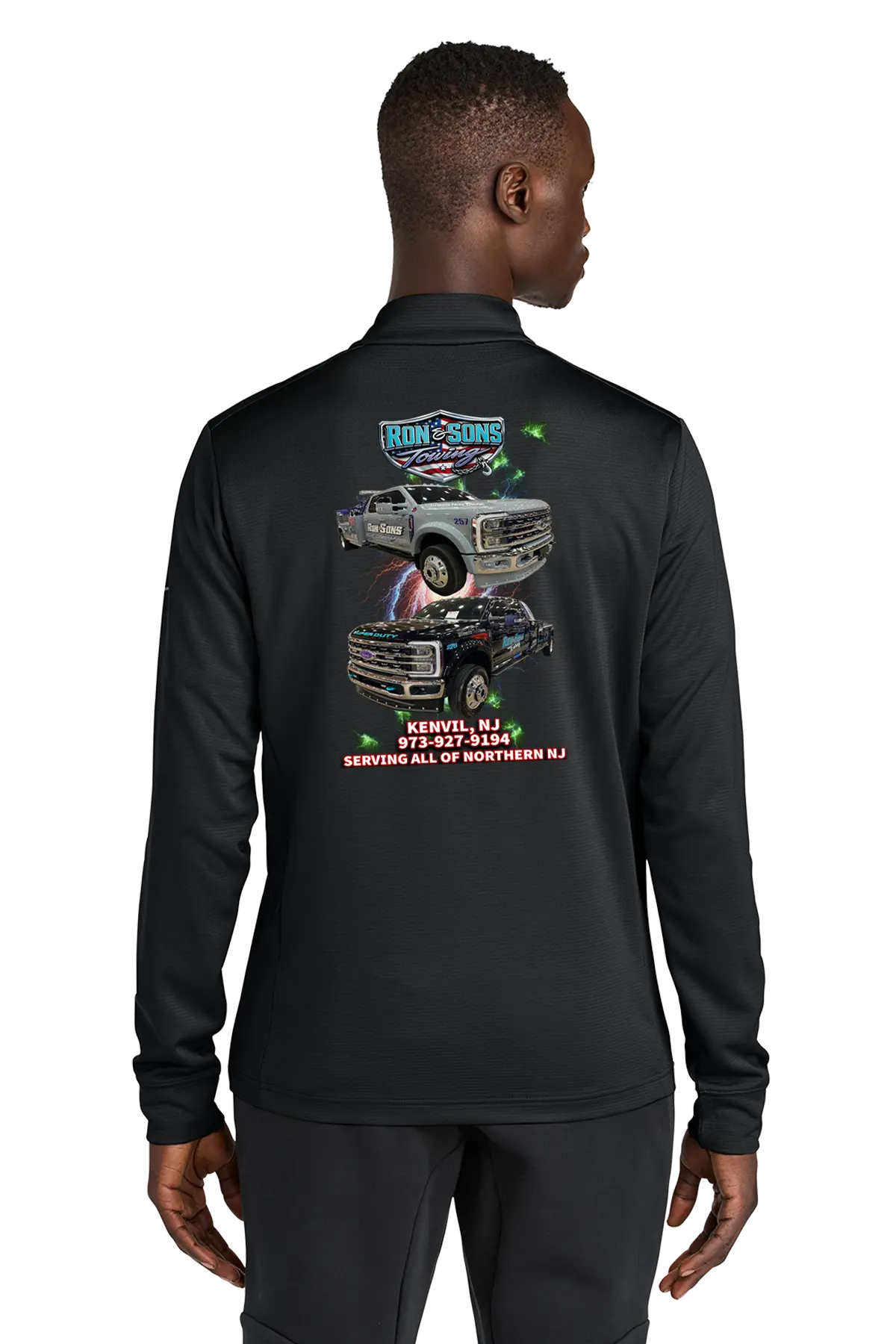 Black long-sleeve shirt with graphic design on the back, worn by a person. Ron and Sons Towing, Paper Street Print Co, Blairstown, NJ.