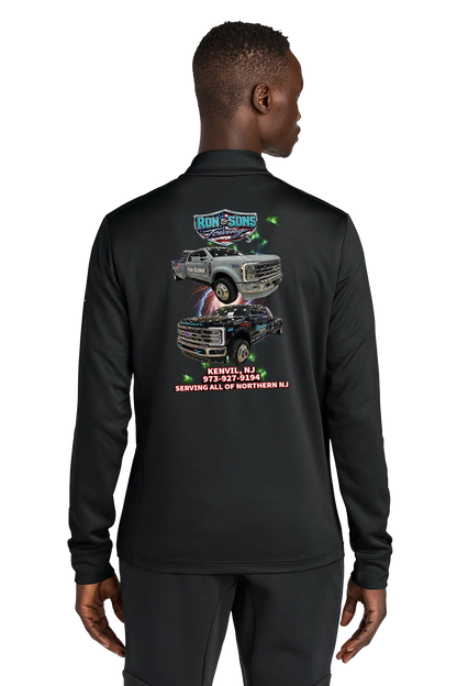 Black long-sleeve shirt with graphic design on the back, worn by a person. Ron and Sons Towing, Paper Street Print Co, Blairstown, NJ.