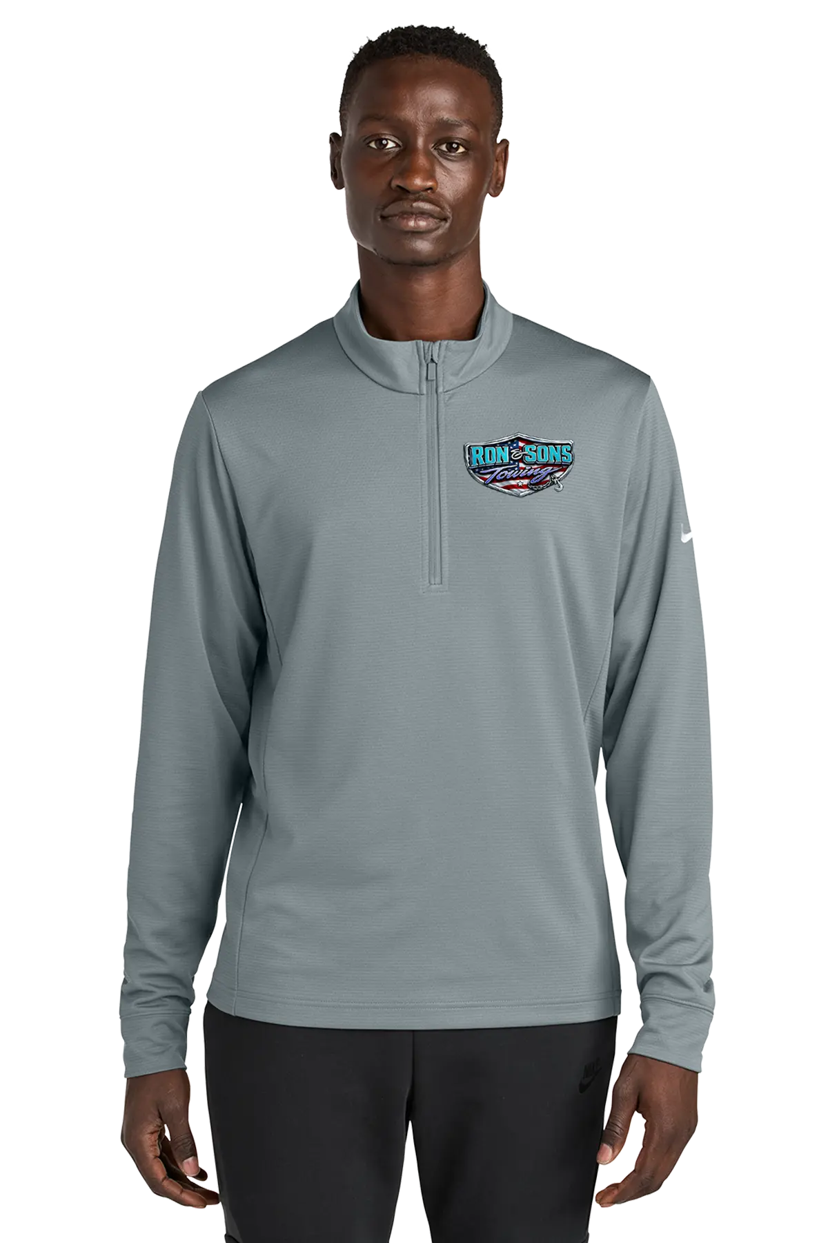 Man wearing a gray pullover with a logo on a white background. Ron and Sons Towing, Paper Street Print Co, Blairstown, NJ.