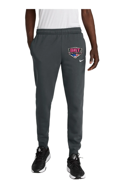 Person wearing gray sweatpants with a logo on a white background. BRT Towing and Recovery, Paper Street Print Co, Blairstown, NJ.