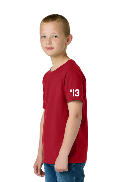 Young boy wearing a red t-shirt with the number 13 on a white background. Paper Street Print Co, Blairstown, NJ.