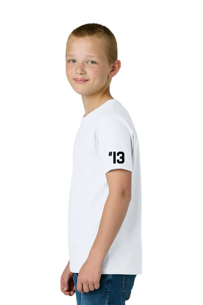 Young boy wearing a white t-shirt with '13' on the sleeve against a white background. Paper Street Print Co, Blairstown, NJ.