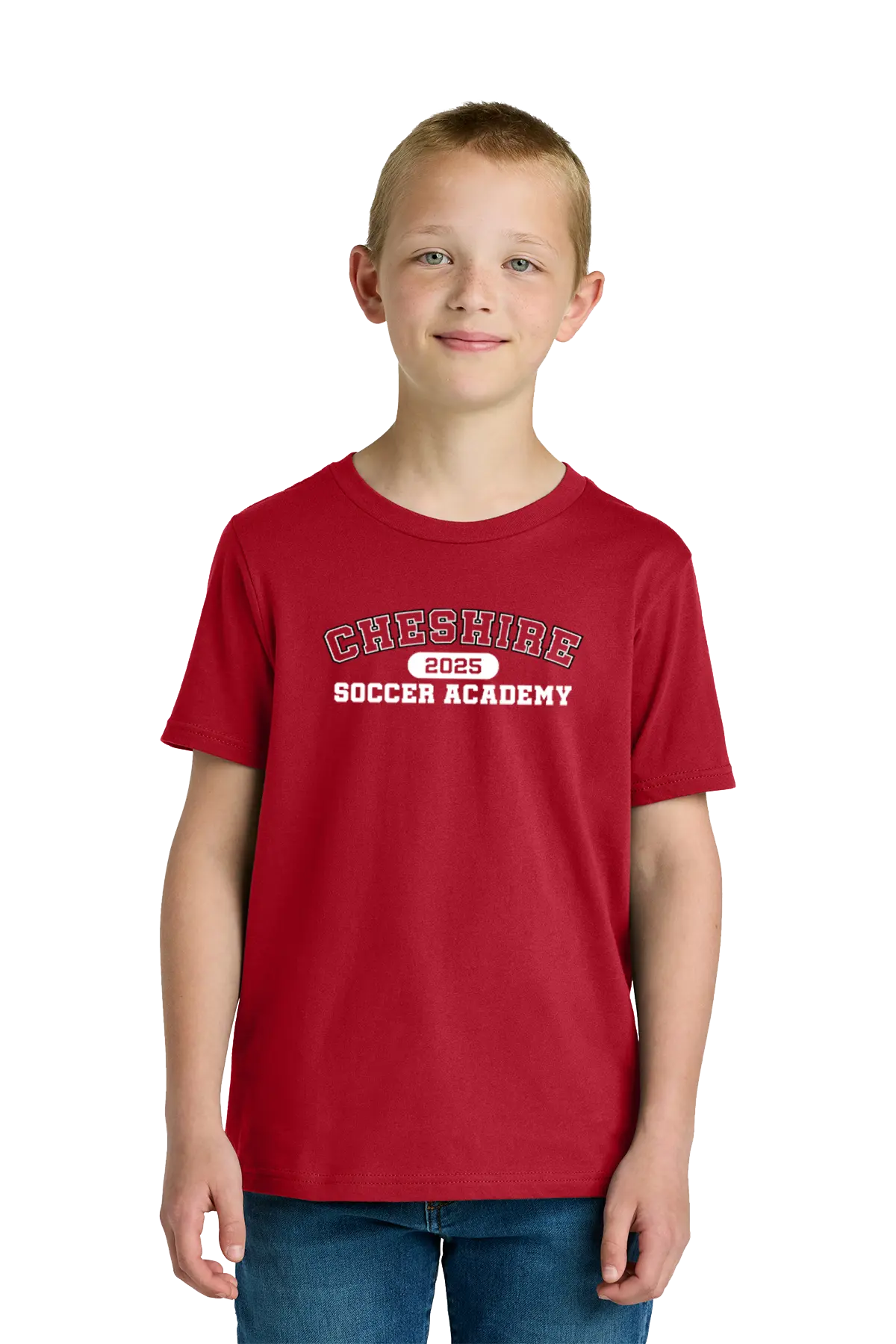 Child wearing a red t-shirt with 'Cheshire Soccer Academy 2023' text on a white background. Paper Street Print Co, Blairstown, NJ.