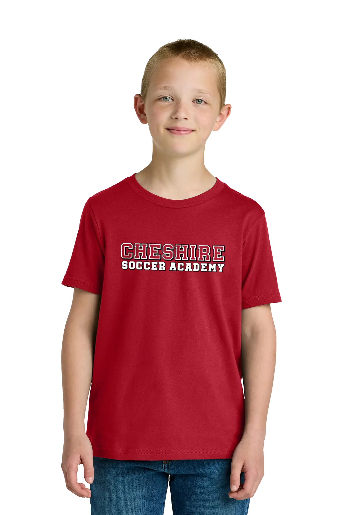 Child wearing a red 'Cheshire Soccer Academy' t-shirt on a white background. Paper Street Print Co, Blairstown, NJ.