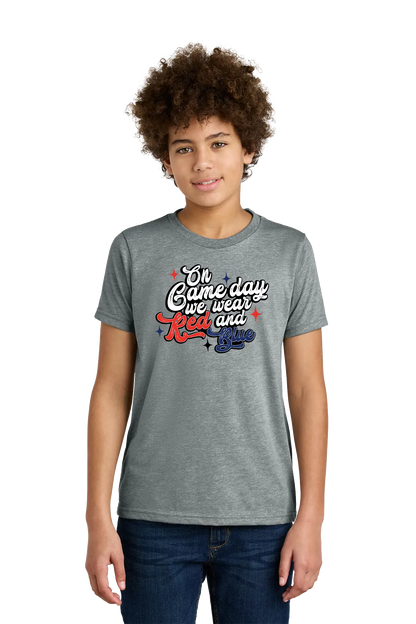 Person wearing a gray t-shirt with colorful text design on a white background. Paper Street Print Co, Blairstown, NJ.