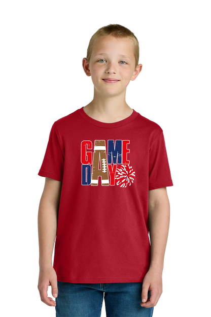 Child wearing a red 'Game Day' t-shirt with football and cheerleading graphics on a white background. Paper Street Print Co, Blairstown, NJ.