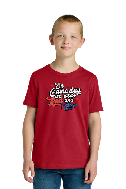 Child wearing a red t-shirt with text on a white background. Paper Street Print Co, Blairstown, NJ.