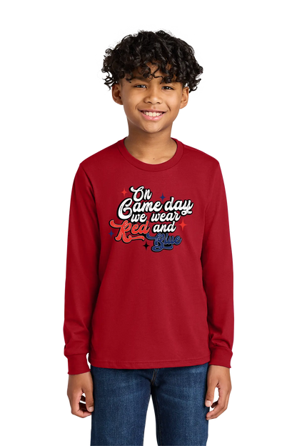Child wearing a red long-sleeve shirt with text on a white background. Paper Street Print Co, Blairstown, NJ.