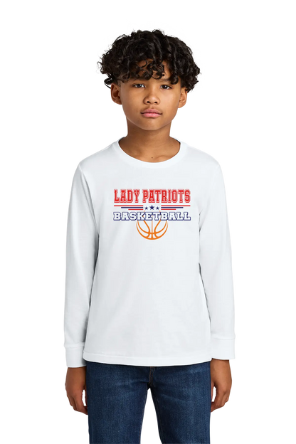 Child wearing a white long-sleeve shirt with 'LADY PATRIOTS BASKETBALL' text and graphics on a white background. Paper Street Print Co, Blairstown, NJ.