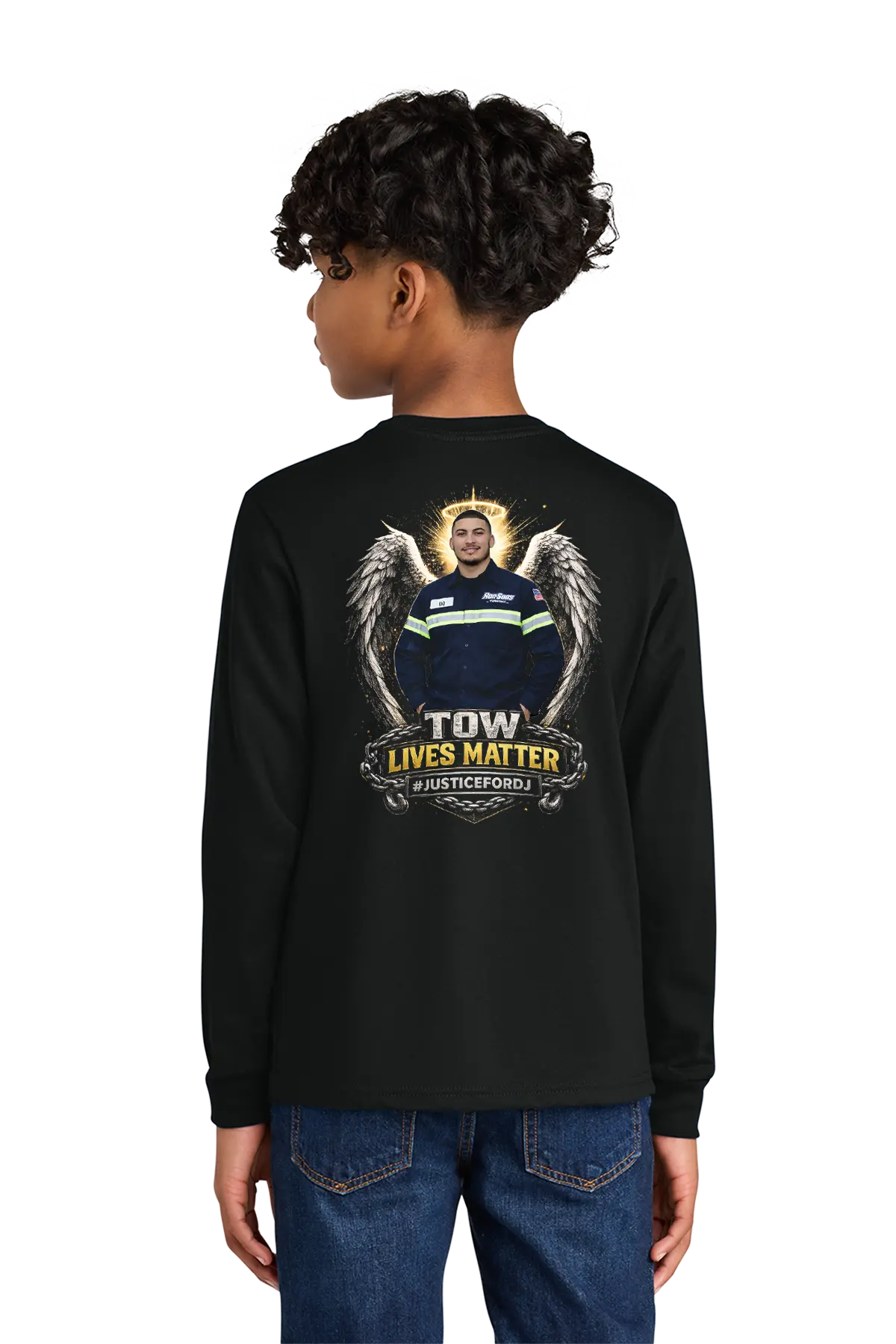 Person wearing a black long-sleeve shirt with a graphic design on the back, standing against a white background. #JUSTICEFORDJ - Paper Street Print Co, Blairstown, NJ.