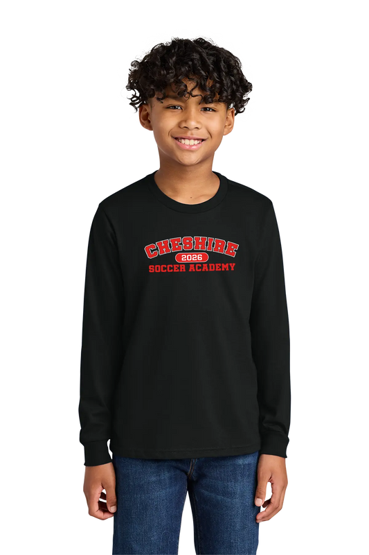 Child wearing a black long-sleeve shirt with 'Cheshire Soccer Academy' text on a white background. Paper Street Print Co, Blairstown, NJ.