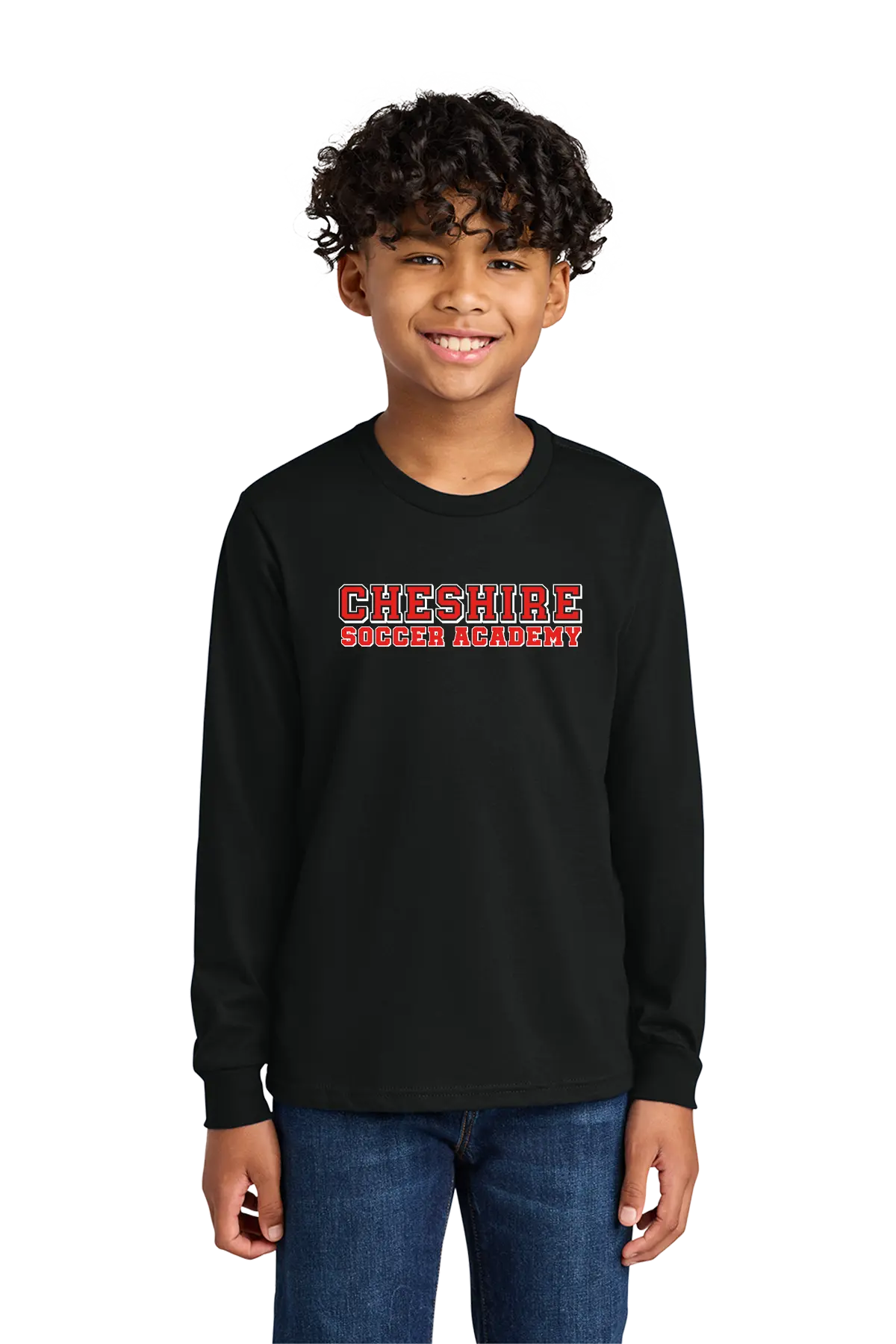 Child wearing a black long-sleeve shirt with 'Cheshire Soccer Academy' text on a white background. Paper Street Print Co, Blairstown, NJ.