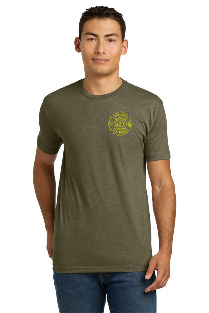 Man wearing an olive green t-shirt with a yellow logo on a white background. Paper Street Print Co, Blairstown, NJ.