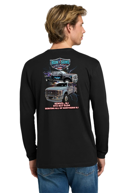 Person wearing a black long-sleeve shirt with graphics and text on the back, standing against a white background. Ron and Sons Towing, Paper Street Print Co, Blairstown, NJ.