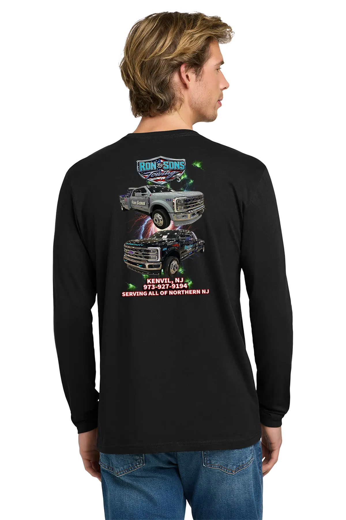 Person wearing a black long-sleeve shirt with graphic designs on the back, standing against a white background. Ron and Sons Towing, Paper Street Print Co, Blairstown, NJ.