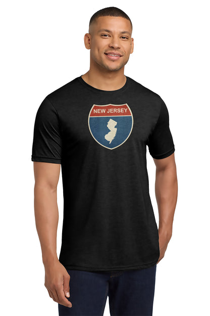 Man wearing a black t-shirt with a New Jersey graphic design on a white background - Paper Street Print Co, Blairstown, NJ