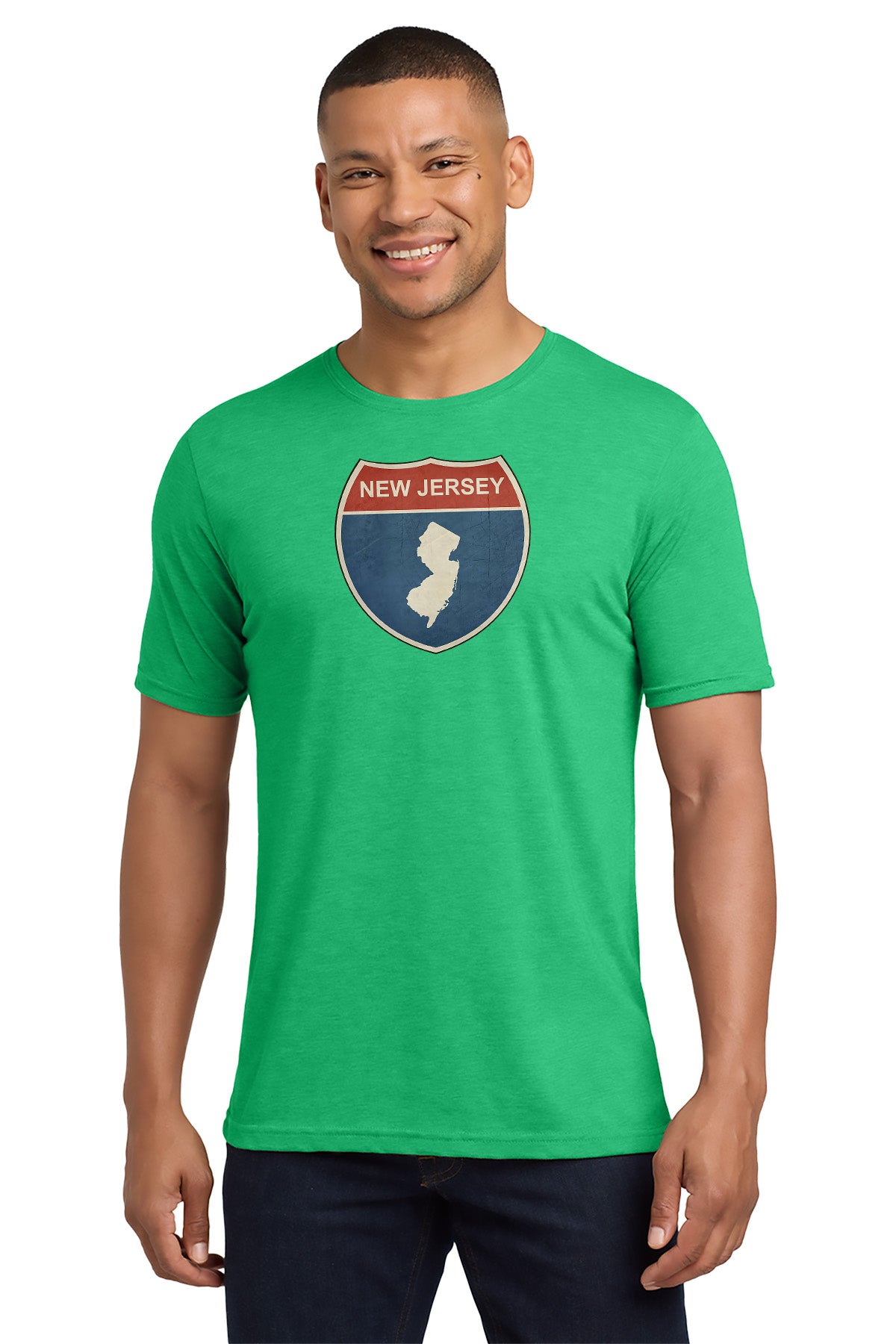 Man wearing a green t-shirt with New Jersey graphic design on a white background - Paper Street Print Co, Blairstown, NJ