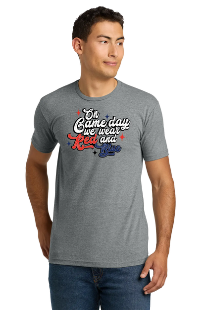 Man wearing a gray t-shirt with a colorful graphic design on a white background. Paper Street Print Co, Blairstown, NJ.
