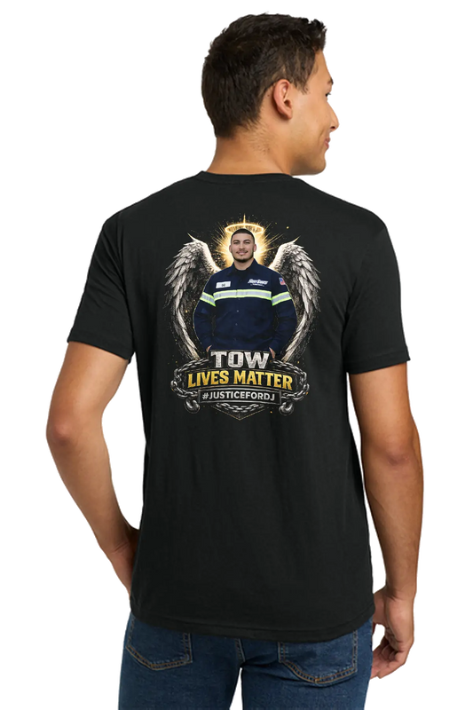 Person wearing a black t-shirt with a graphic design on the back, featuring text and an image of a person in a sports jersey. #JusticeforDJ - Paper Street Print Co, Blairstown, NJ.