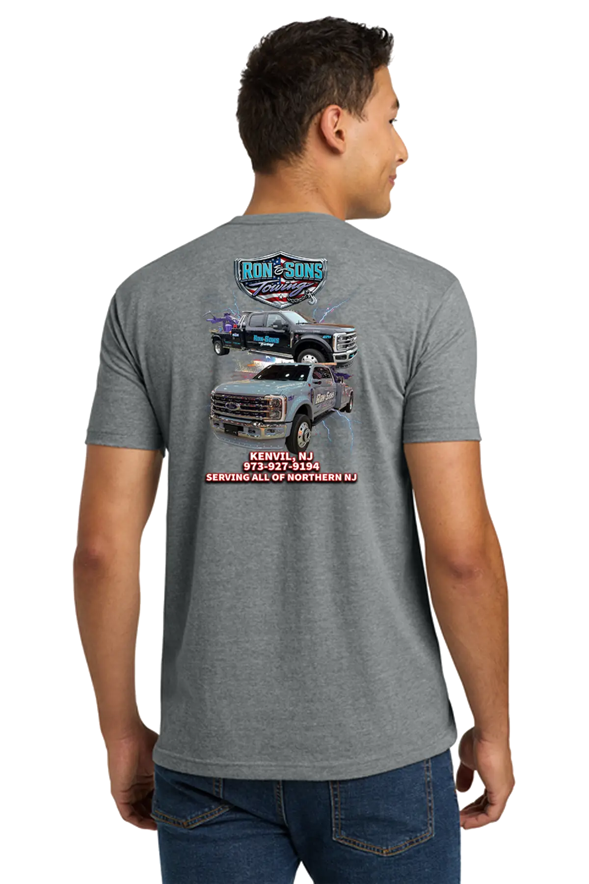 Person wearing a gray t-shirt with a graphic of a truck and text on the back. Ron and Sons Towing, Paper Street Print Co, Blairstown, NJ.