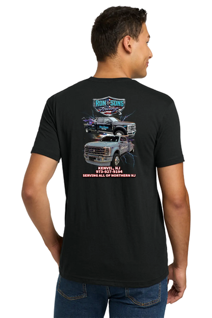 Man wearing a black t-shirt with a graphic design on the back, standing against a white background. Ron & Sons Towing, Paper Street Print Co, Blairstown, NJ.