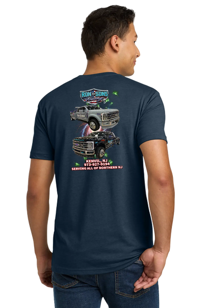 Person wearing a navy blue t-shirt with graphics and text on the back, on a white background. Ron and Sons Towing, Paper Street Print Co, Blairstown, NJ.