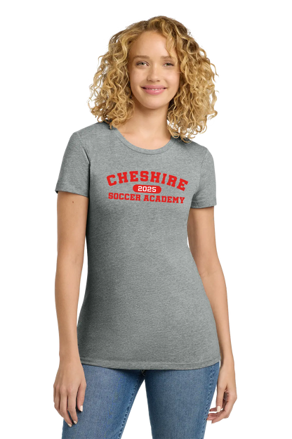 Woman wearing a gray t-shirt with 'Cheshire Soccer Academy' text on a white background. Paper Street Print Co, Blairstown, NJ.