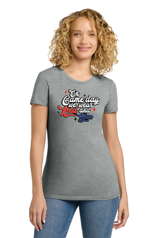 Woman wearing a gray t-shirt with a colorful graphic design on a white background. Paper Street Print Co, Blairstown, NJ.