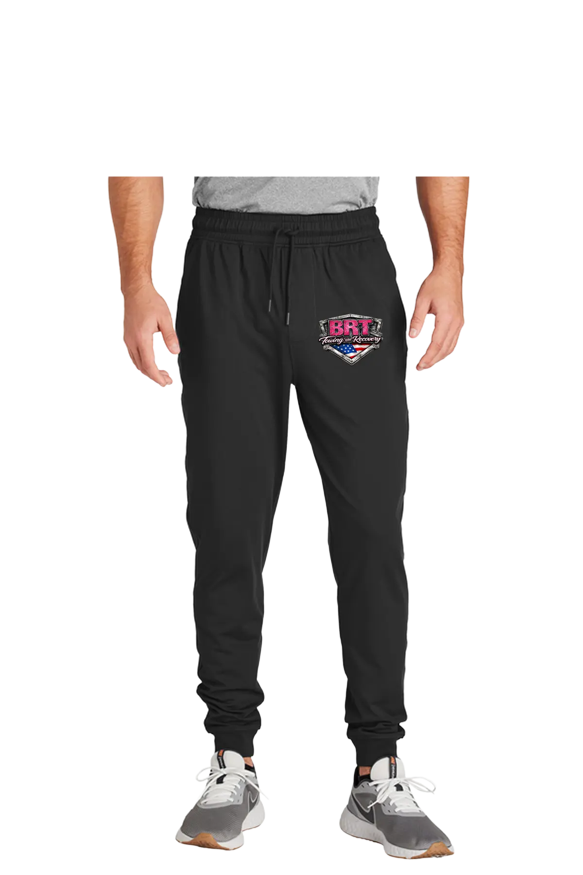 Black jogger pants with a logo on a white background. BRT Towing and Recovery, Paper Street Print Co, Blairstown, NJ.