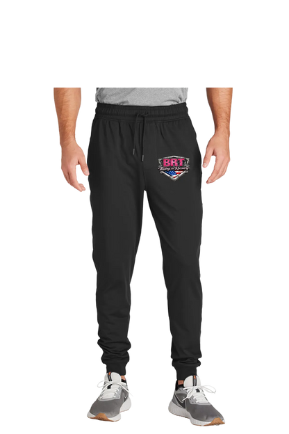 Black jogger pants with a logo on a white background. BRT Towing and Recovery, Paper Street Print Co, Blairstown, NJ.