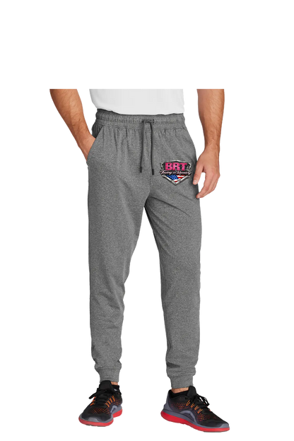 Person wearing gray jogger pants with a logo on a white background. BRT Towing and Recovery, Paper Street Print Co, Blairstown, NJ.