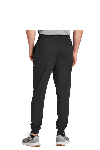 Person wearing black jogger pants on a white background. BRT Towing and Recovery, Paper Street Print Co, Blairstown, NJ.