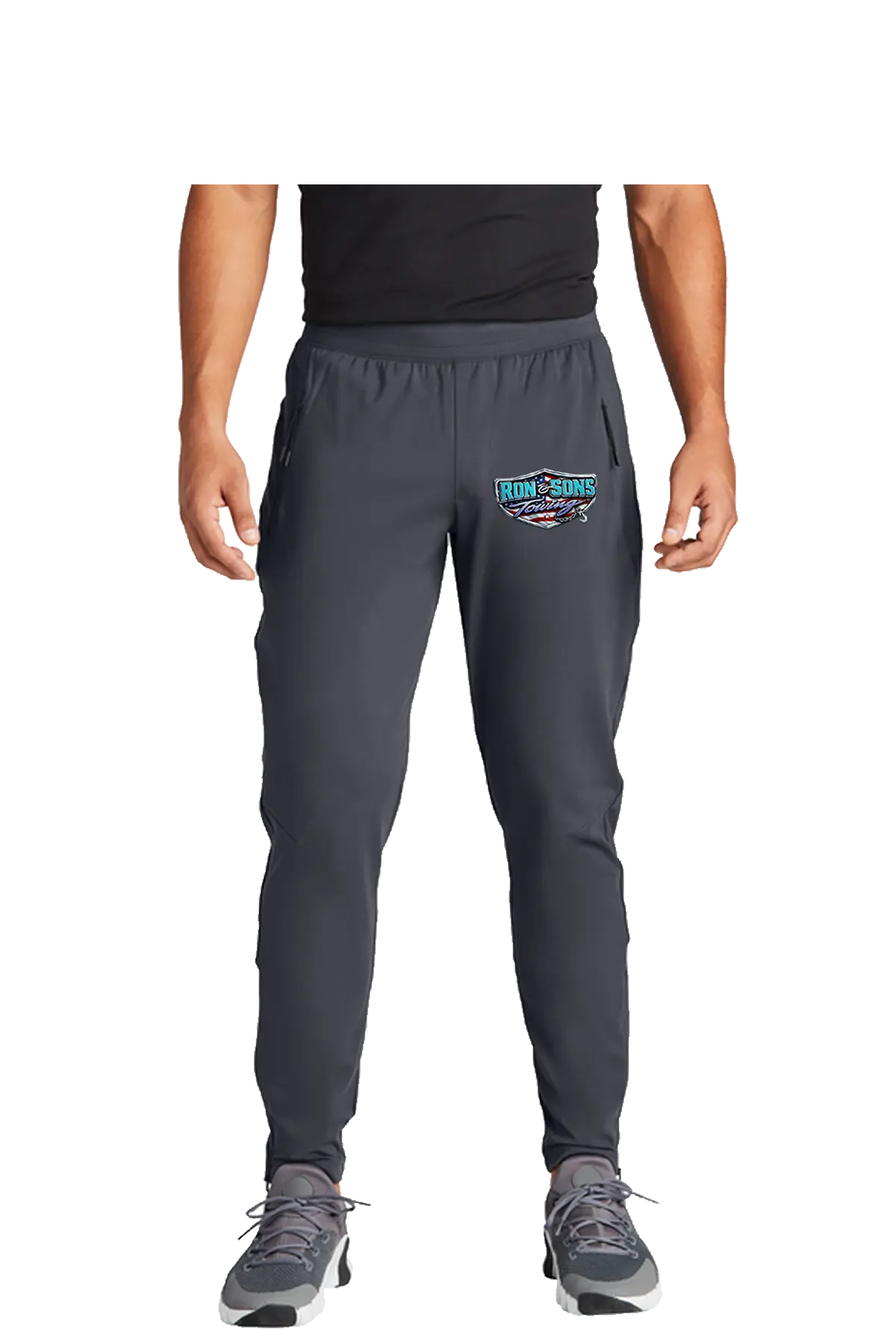 Person wearing gray jogger pants with a logo on a white backgroundRon and Sons Towing, Paper Street Print Co, Blairstown, NJ.