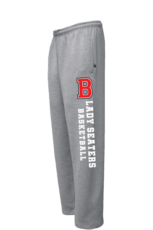Gray sweatpants with a red and white 'B' logo and vertical white text reading 'LADY SEATERS BASKETBALL' on the left leg, shown against a plain white background. Paper Street Print Co, Blairstown, NJ.