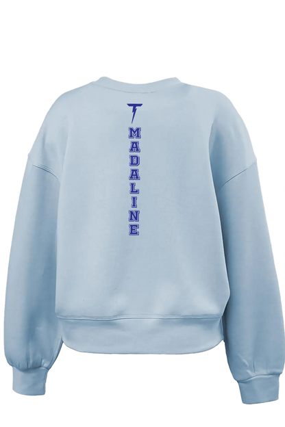 Light blue sweatshirt with 'MADALINE' printed vertically on the back against a white background. Paper Street Print Co, Blairstown, NJ.