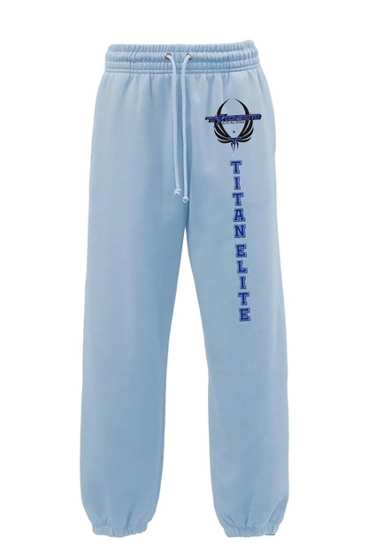 Light blue sweatpants with 'Titan Elite' logo and text on a white background. Paper Street Print Co, Blairstown, NJ.