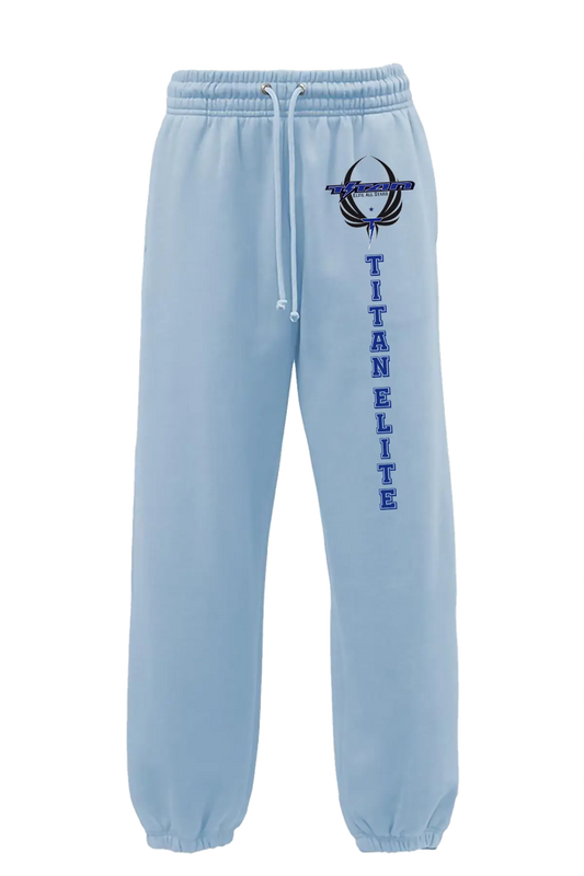 Light blue sweatpants with 'Titan Elite' logo and text on a white background. Paper Street Print Co, Blairstown, NJ.