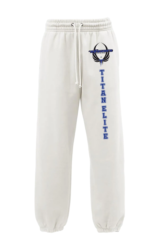 White sweatpants with 'Titan Elite' text and logo on a white background. Paper Street Print Co, Blairstown, NJ.