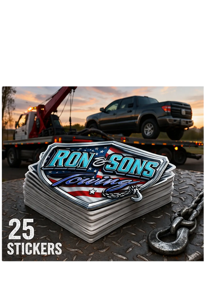 Stack of 'Ron and Sons Towing' stickers with towing truck in the background. Paper Street Print Co, Blairstown, NJ.