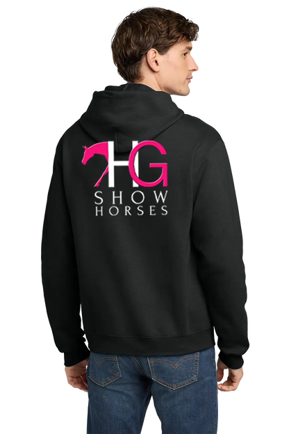 A man wearing a black hoodie from the back, featuring a large graphic on the back with a pink horse silhouette, the letters 'HG' in white and pink, and the words 'SHOW HORSES' in white. He is also wearing blue jeans, set against a plain white background. HG Show Horses, Paper Street Print Co, Blairstown, NJ.