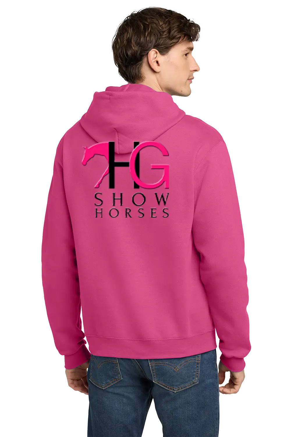 A man wearing a bright pink hoodie from the back, featuring a large black and pink 'HG SHOW HORSES' logo printed on the back, paired with blue jeans against a white background. HG Show Horses, Paper Street Print Co, Blairstown, NJ.
